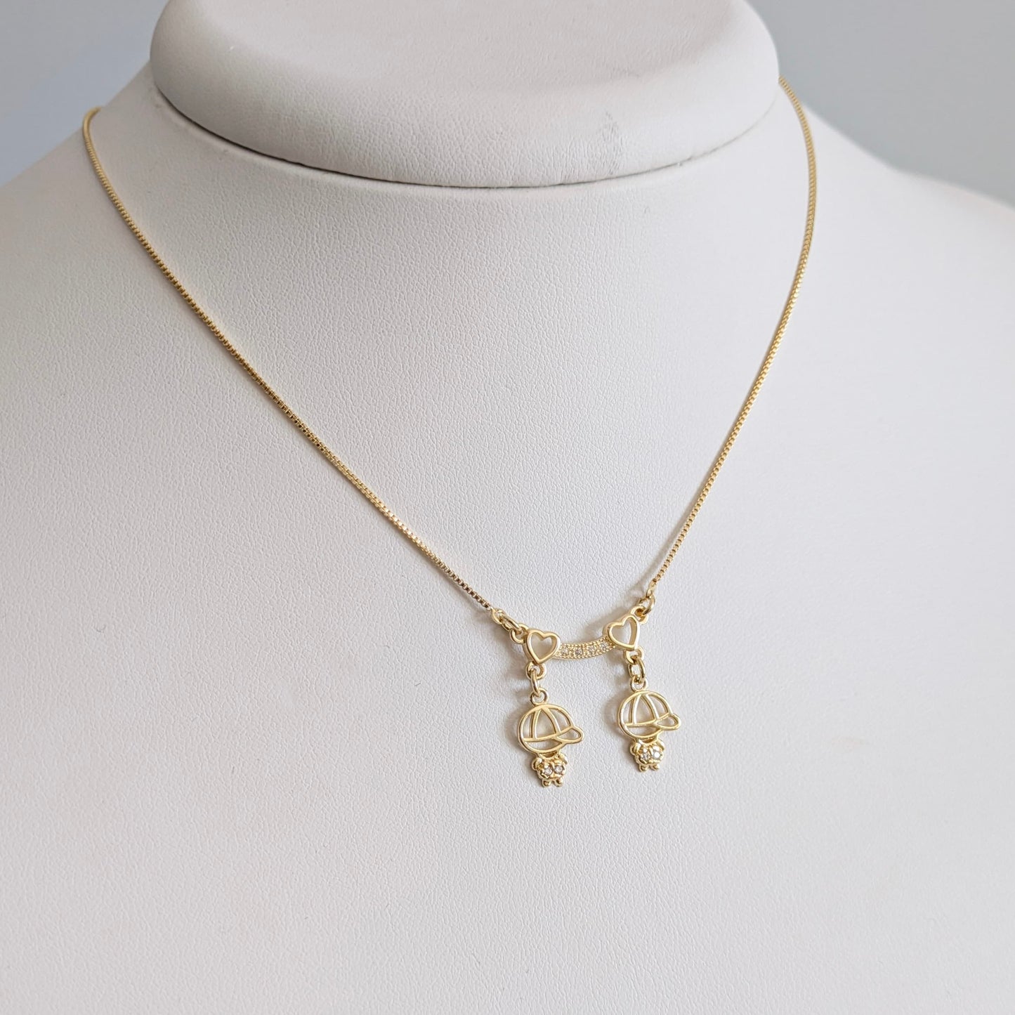Two boys love necklace