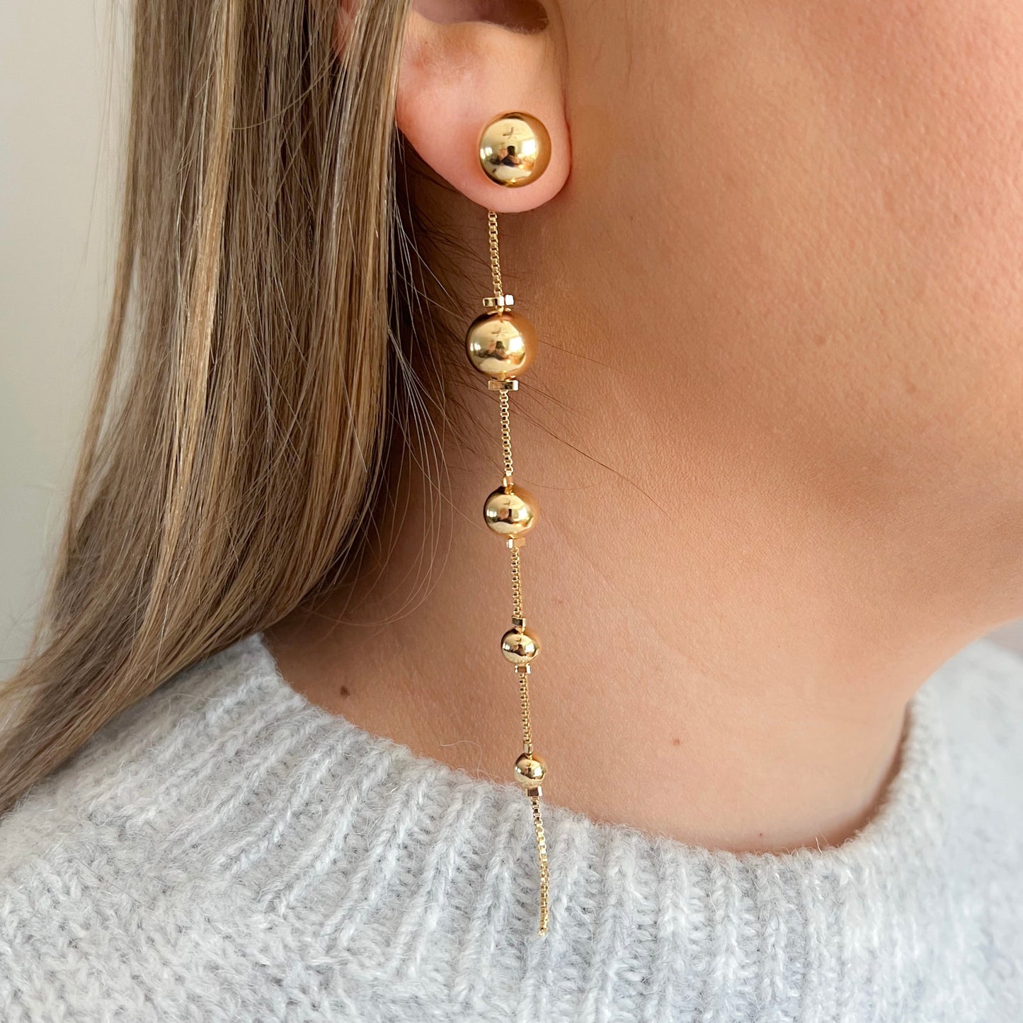 Balls dangle long earrings